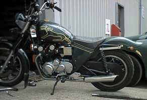 [Left view of bike with silencer fitted ]