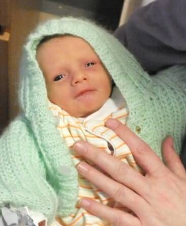 [Hattie in green cardigan ]